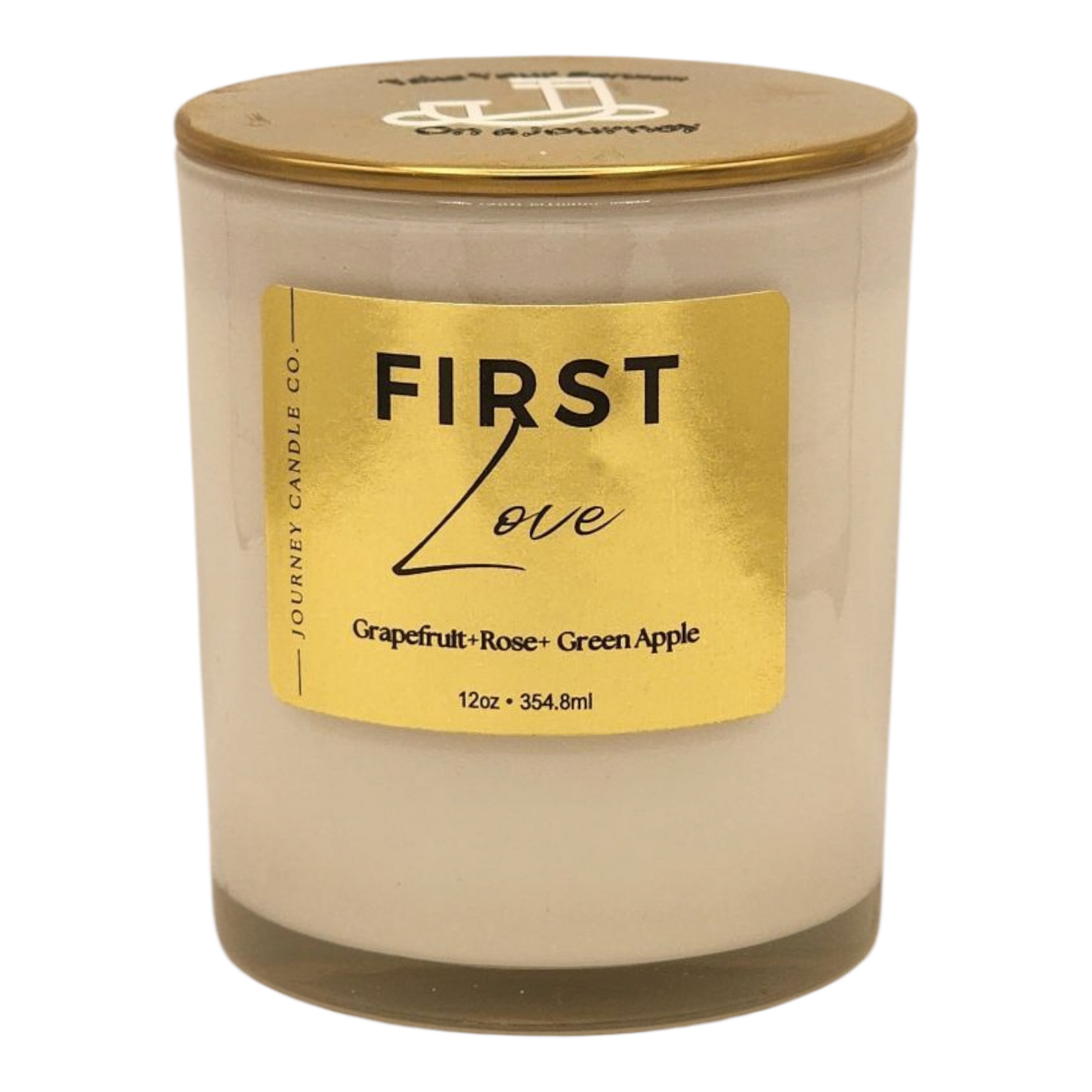First Love 12 oz soy candle by Journey Candle Co. – a bright, romantic blend of grapefruit, green apple, and soft rose in a white jar with gold lid.