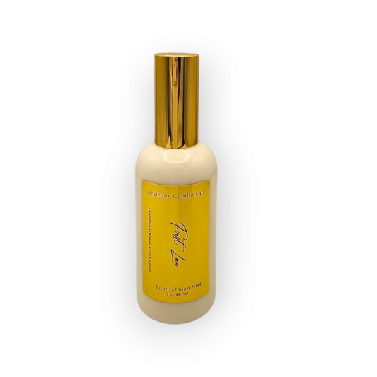 First Love room and linen spray by Journey Candle Co. – sweet blend of grapefruit, green apple, and soft rose in a 3 oz gold-capped spray bottle.