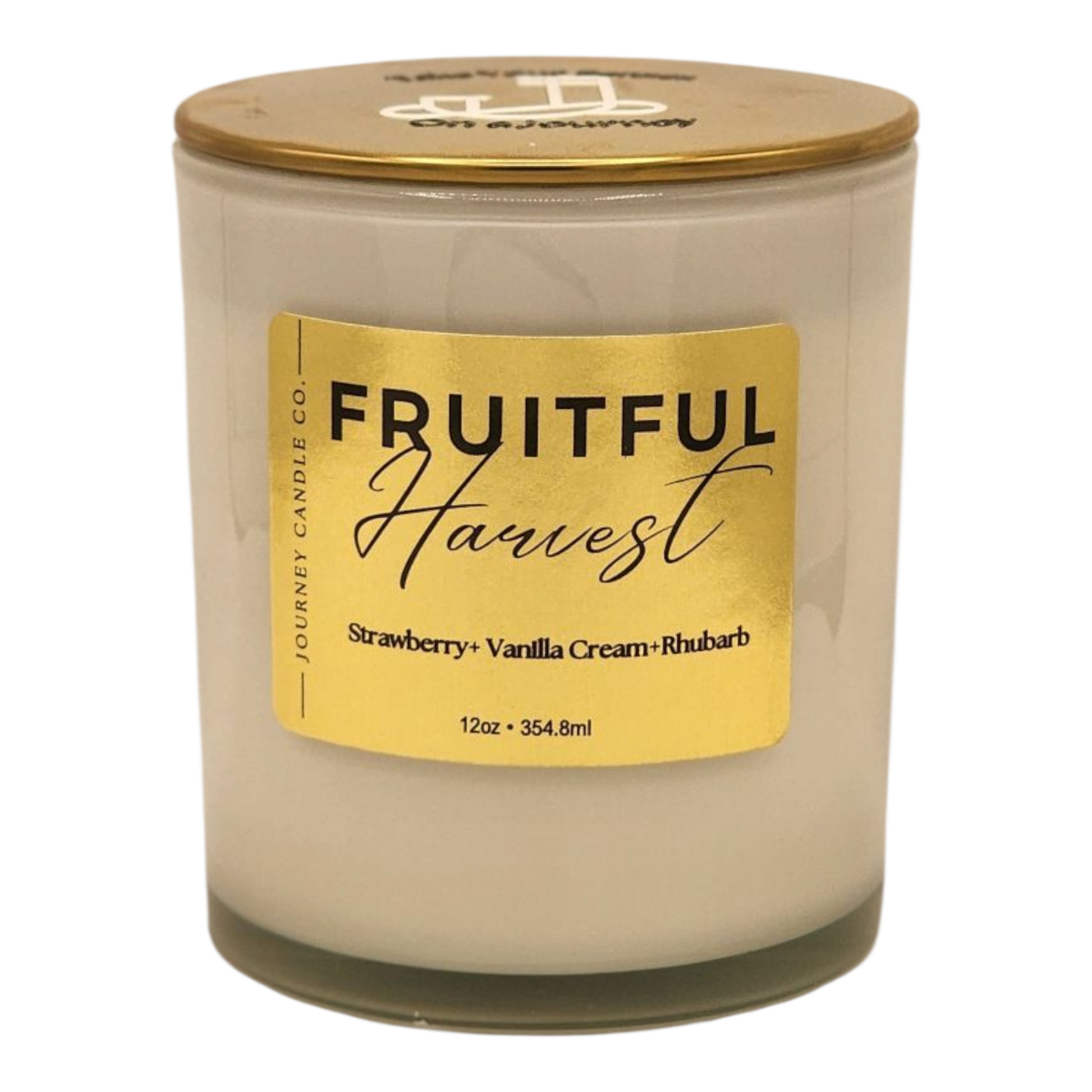 Fruitful Harvest 12 oz soy candle by Journey Candle Co. – sweet, creamy blend of ripe strawberry, tart rhubarb, and vanilla cream in white jar with gold lid.