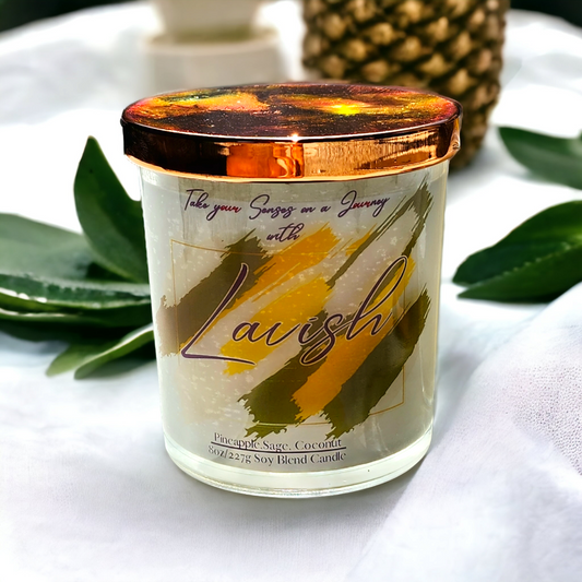 Lavish 8 oz soy wax blend candle with tropical pineapple sage and creamy coconut, hand-poured in a luxury glass jar with a sleek gold lid.