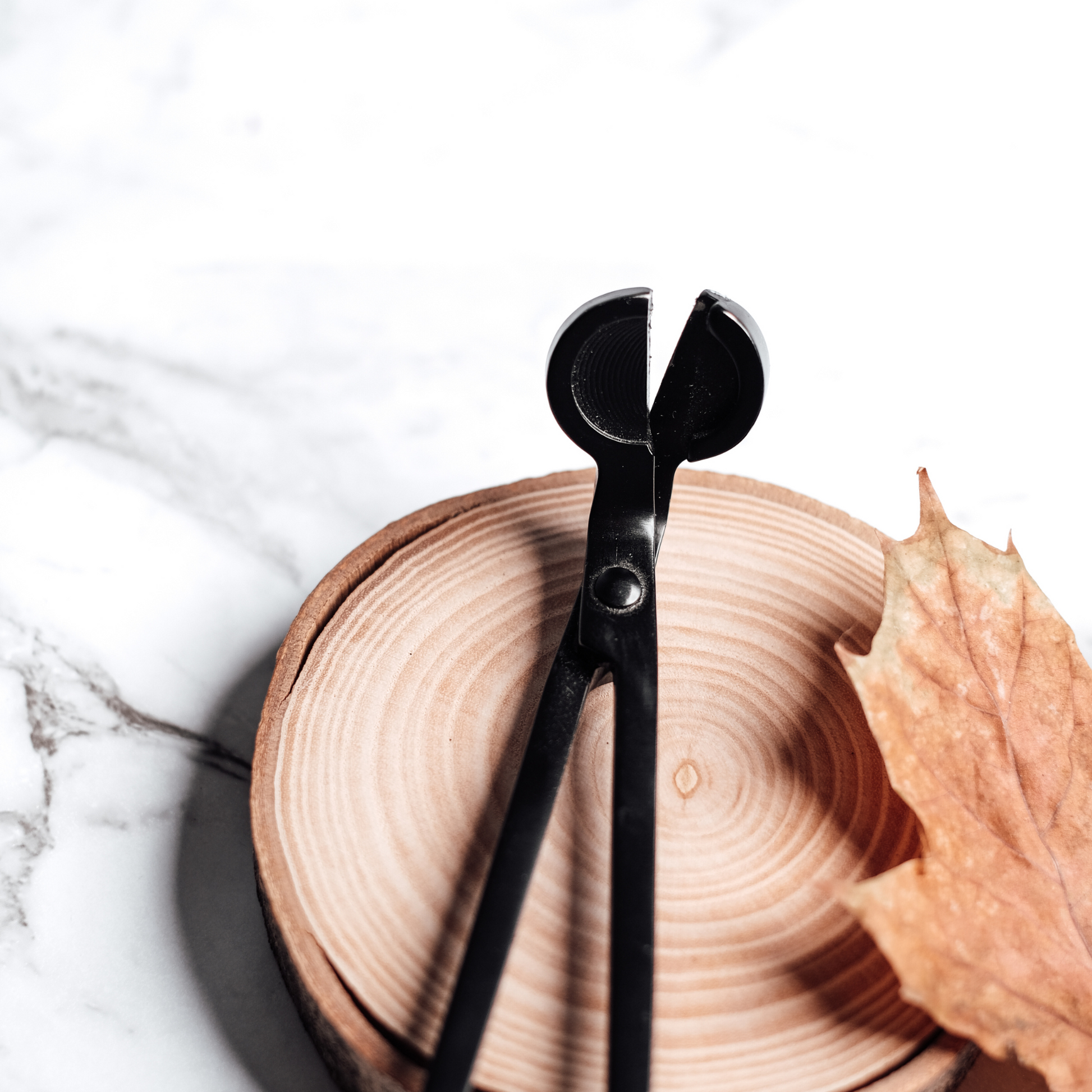 Matte black wick trimmer for candles – sleek design for clean, even burns and a polished candle care routine