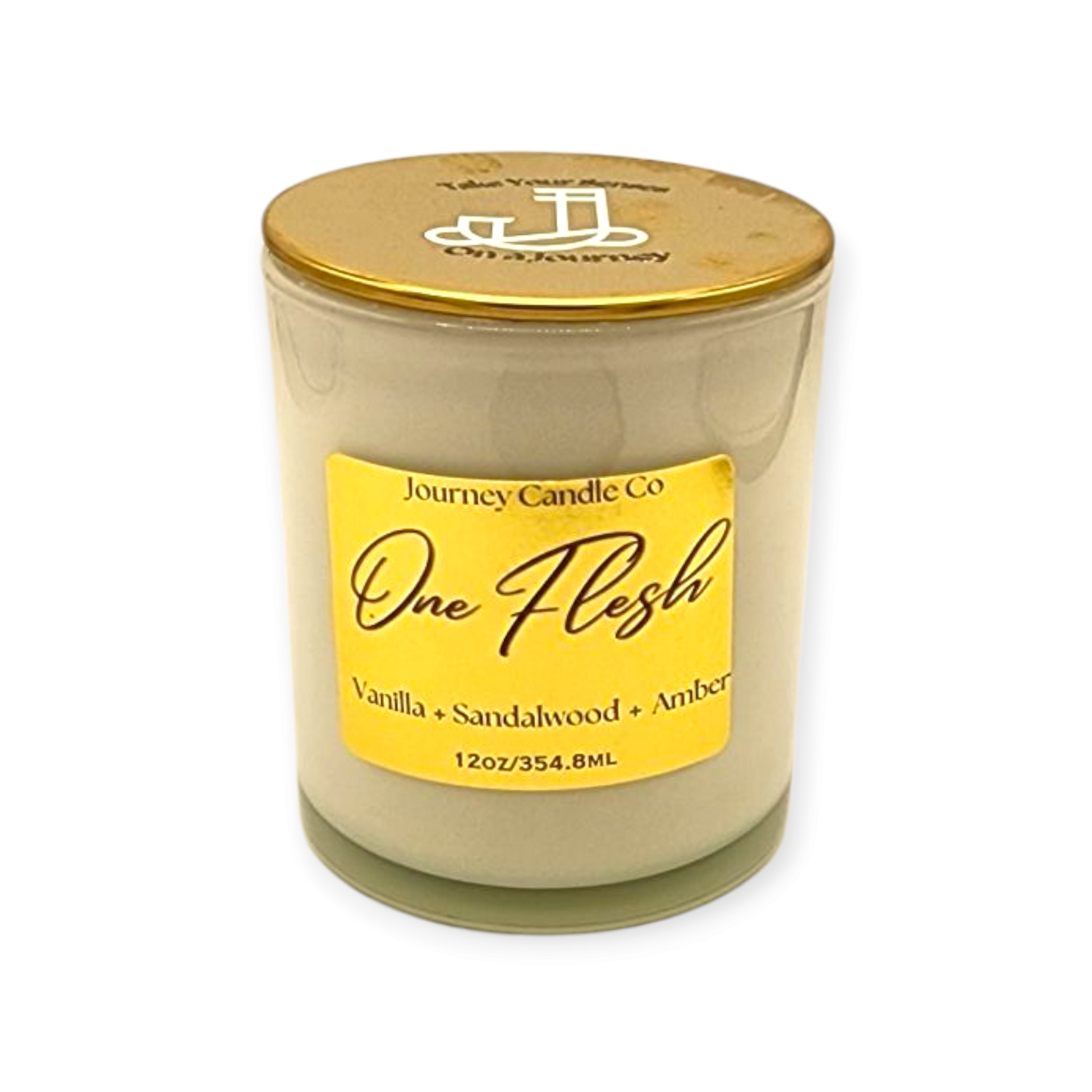 One Flesh 12 oz soy candle by Journey Candle Co. – warm blend of vanilla, sandalwood, and amber in white jar with gold lid. Romantic, long-lasting home fragrance perfect for cozy spaces or gifting.